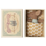 Small stuffed maileg mouse toy in a decorative matchbox 