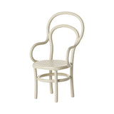 childrens dollshouse  White chair with a minimalist design on a white background